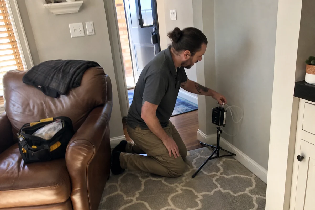 IEP using air sampling pump to test indoor air quality